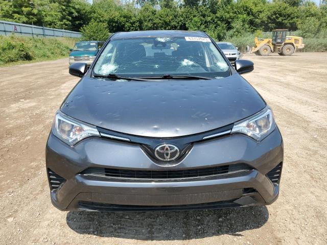 Photo 5 from auction – 2018 TOYOTA RAV4 LE with VIN JTMBFREV7JJ730032