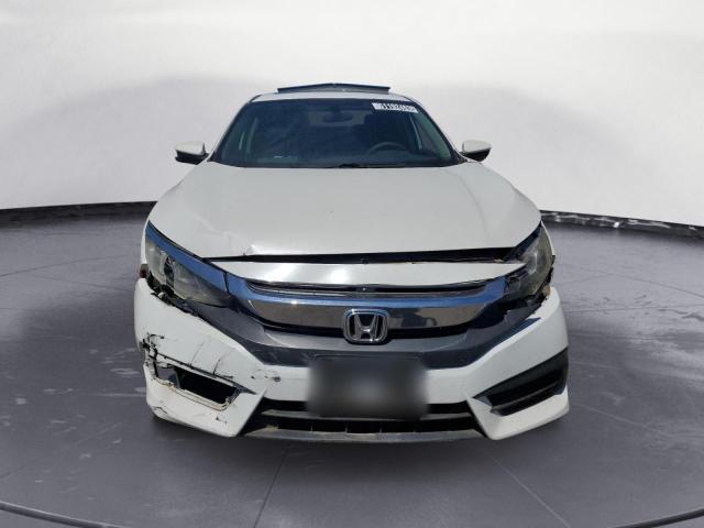 Photo 5 from auction – 2018 HONDA CIVIC EX with VIN 19XFC2F78JE206189