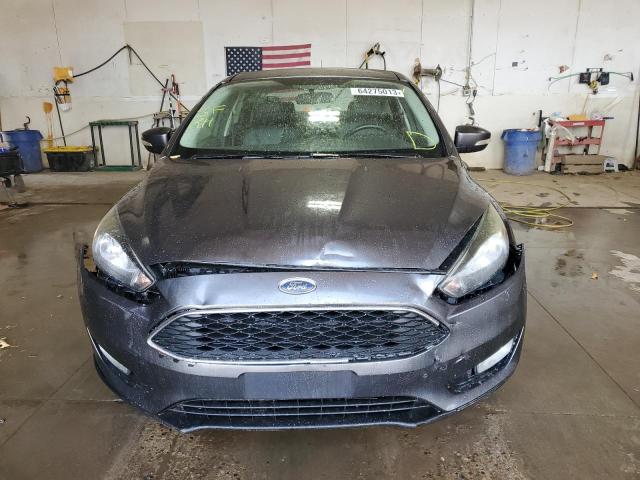 Photo 5 from auction – 2015 FORD FOCUS SE with VIN 1FADP3F23FL218583