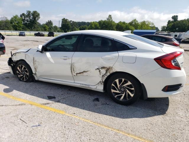 Photo 2 from auction – 2018 HONDA CIVIC EX with VIN 19XFC2F75JE011277