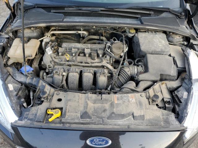 Photo 11 from auction – 2015 FORD FOCUS SE with VIN 1FADP3F22FL384335