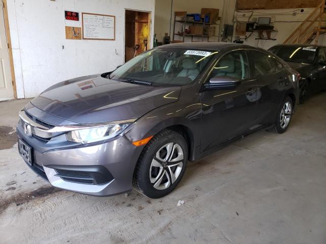 HONDA CIVIC LX 2018 with VIN 19XFC2F58JE035183 - Photo from auction