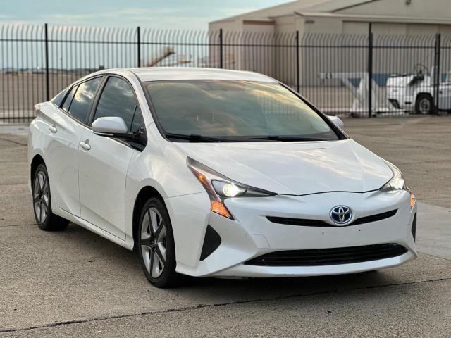 Photo 2 from auction – 2016 TOYOTA PRIUS with VIN JTDKARFU3G3023883