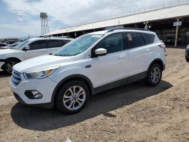 FORD ESCAPE SE 2018 with VIN 1FMCU0GD4JUC20502 - Photo from auction