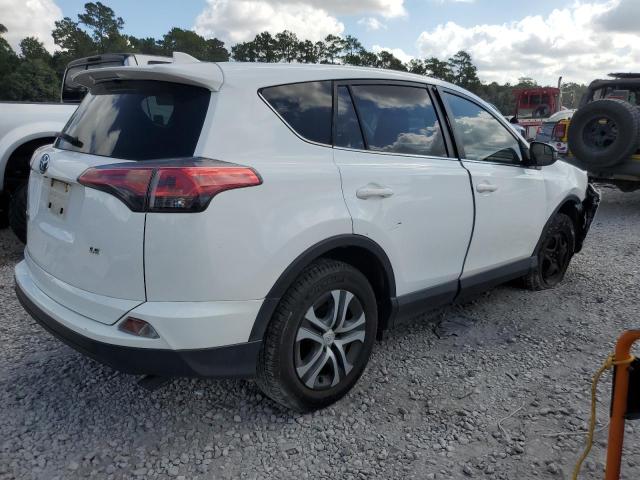 Photo 3 from auction – 2018 TOYOTA RAV4 LE with VIN JTMZFREV0JJ163175
