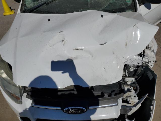 Photo 11 from auction – 2013 FORD FOCUS S with VIN 1FADP3E24DL151636