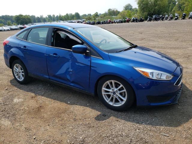 Снимка 4 от търг – 2018 FORD FOCUS SE с VIN 1FADP3FE4JL209975