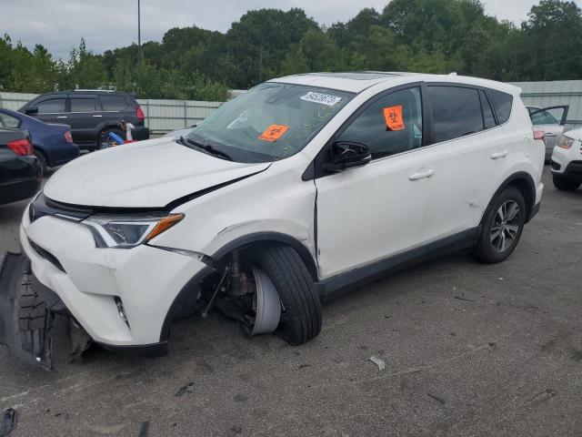 TOYOTA RAV4 ADVEN 2018 with VIN 2T3RFREV9JW810979 - Photo from auction