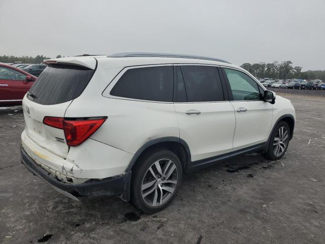 Photo 3 from auction – 2017 HONDA PILOT TOUR with VIN 5FNYF6H9XHB102099