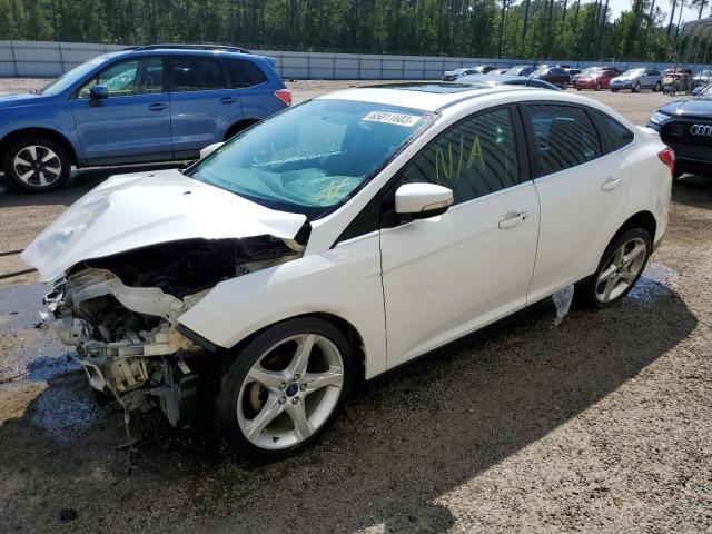 Photo 1 from auction – 2014 FORD FOCUS TITA with VIN 1FADP3J22EL179622