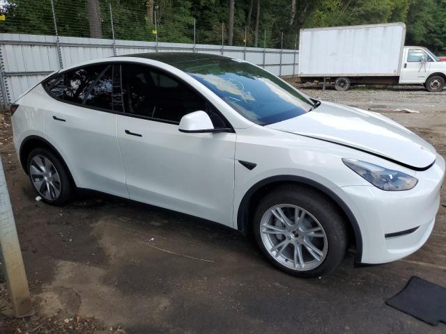 Снимка 4 от търг – 2023 TESLA MODEL Y с VIN 7SAYGDEE5PF621064