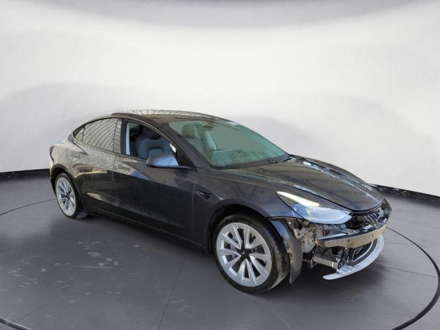 Photo 4 from auction – 2022 TESLA MODEL 3 with VIN 5YJ3E1EA0NF143481