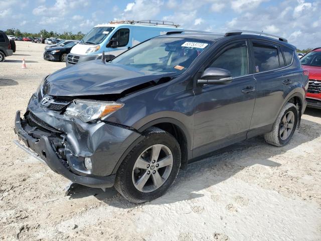 TOYOTA RAV4 XLE 2015 with VIN JTMRFREV0FD165983 - Photo from auction