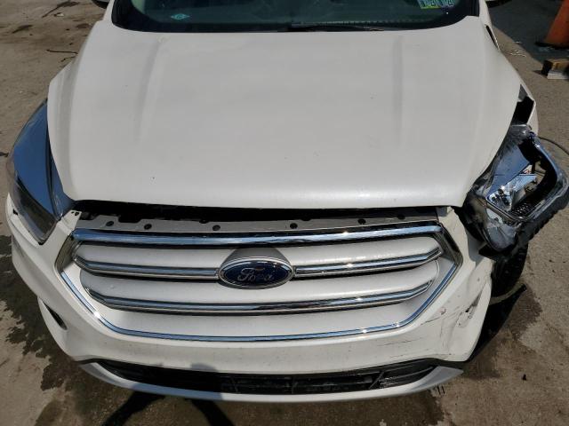 Photo 12 from auction – 2018 FORD ESCAPE SE with VIN 1FMCU9GD8JUC00659