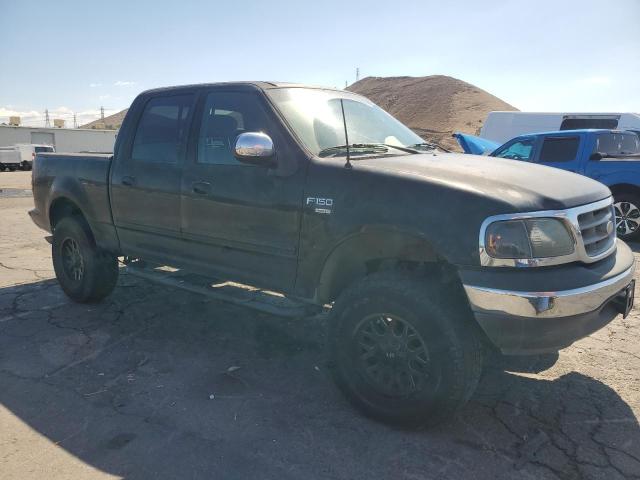 Photo 4 from auction – 2002 FORD F150 SUPER with VIN 1FTRW07L12KC97907