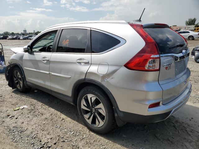 Photo 2 from auction – 2016 HONDA CR-V TOURI with VIN 5J6RM3H93GL029317