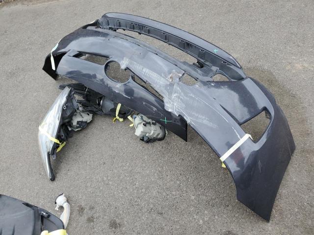 Photo 12 from auction – 2014 TOYOTA PRIUS PLUG with VIN JTDKN3DP1E3060331