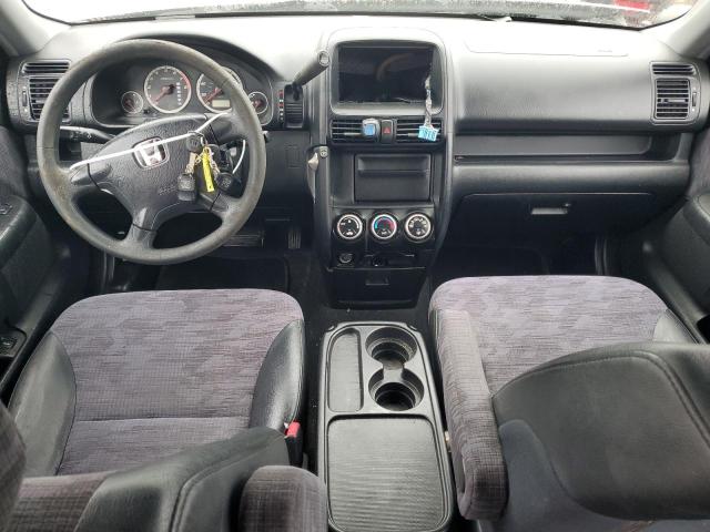 Photo 8 from auction – 2002 HONDA CR-V LX with VIN JHLRD68522C007292