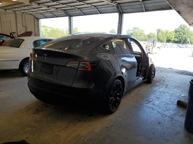 Photo 3 from auction – 2021 TESLA MODEL Y with VIN 5YJYGDED9MF106195