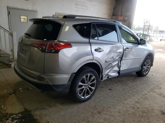 Photo 3 from auction – 2018 TOYOTA RAV4 LIMIT with VIN JTMDFREV3JD247970
