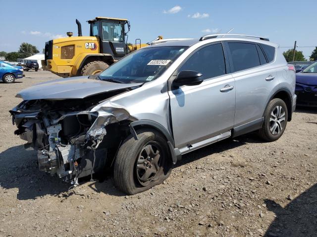 TOYOTA RAV4 LE 2018 with VIN JTMBFREV3JD248902 - Photo from auction
