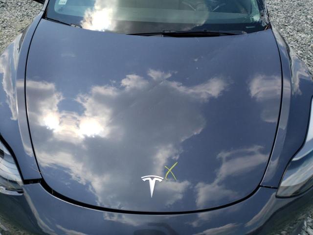 Снимка 11 от търг – 2023 TESLA MODEL 3 с VIN 5YJ3E1EAXPF402416