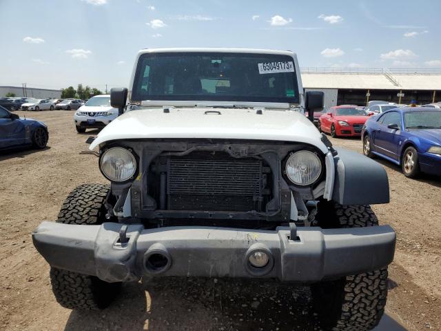 Photo 5 from auction – 2013 JEEP WRANGLER U with VIN 1C4BJWFG1DL523657