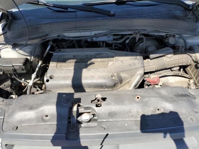 Photo 12 from auction – 2004 HONDA PILOT LX with VIN 2HKYF181X4H555230