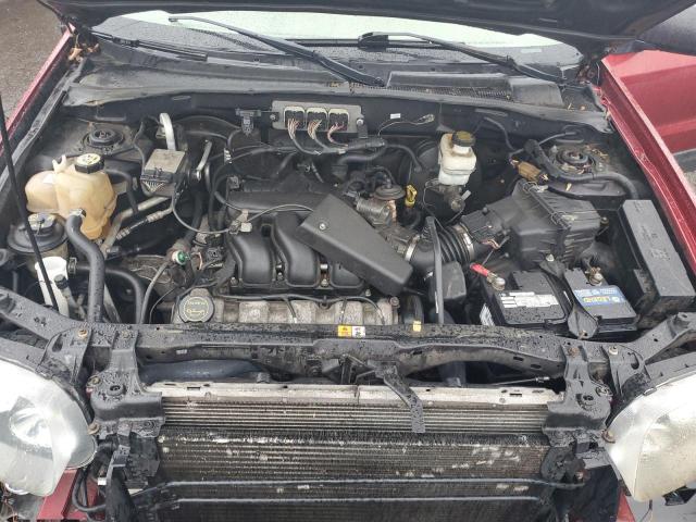 Photo 11 from auction – 2006 FORD ESCAPE XLT with VIN 1FMYU93136KB77960