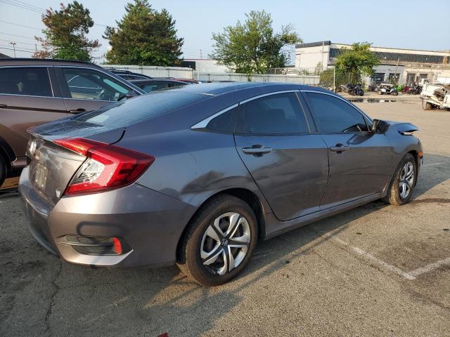 Снимка 3 от търг – 2017 HONDA CIVIC LX с VIN 19XFC2F53HE023047