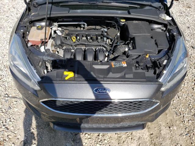 Photo 11 from auction – 2015 FORD FOCUS SE with VIN 1FADP3F25FL330821