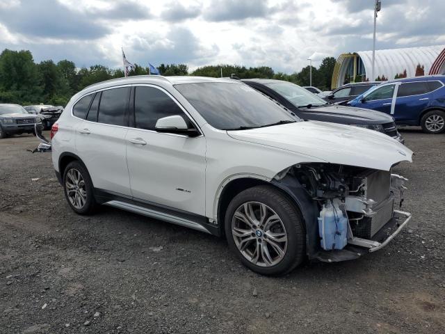 Photo 4 from auction – 2017 BMW X1 XDRIVE2 with VIN WBXHT3C36H5F78321
