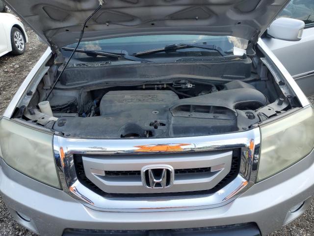 Photo 12 from auction – 2010 HONDA PILOT TOUR with VIN 5FNYF4H94AB039527