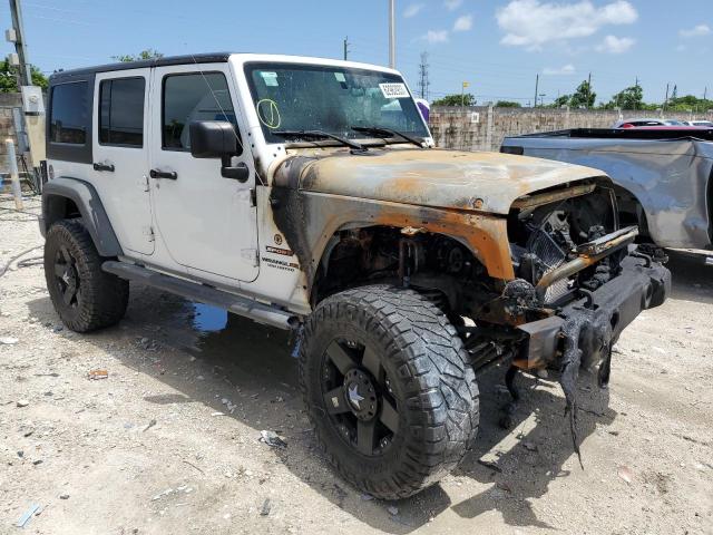 Photo 4 from auction – 2012 JEEP WRANGLER U with VIN 1C4HJWDGXCL135550