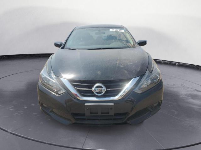 Photo 5 from auction – 2016 NISSAN ALTIMA 2.5 with VIN 1N4AL3AP4GC264247