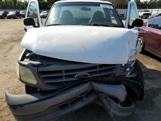 Photo 11 from auction – 2003 FORD F150 with VIN 1FTRF17W73NA19349