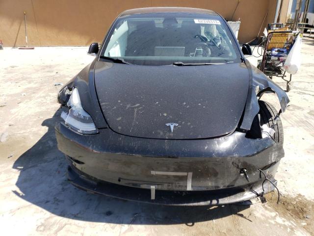 Снимка 5 от търг – 2018 TESLA MODEL 3 с VIN 5YJ3E1EA7JF009383