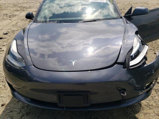Photo 11 from auction – 2021 TESLA MODEL 3 with VIN 5YJ3E1EA7MF089028
