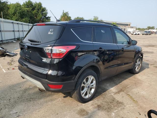 Photo 3 from auction – 2018 FORD ESCAPE SE with VIN 1FMCU9GD9JUA61903