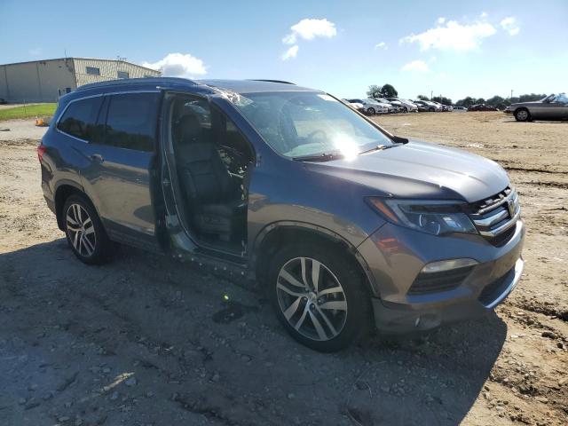 Photo 4 from auction – 2017 HONDA PILOT TOUR with VIN 5FNYF5H99HB008287