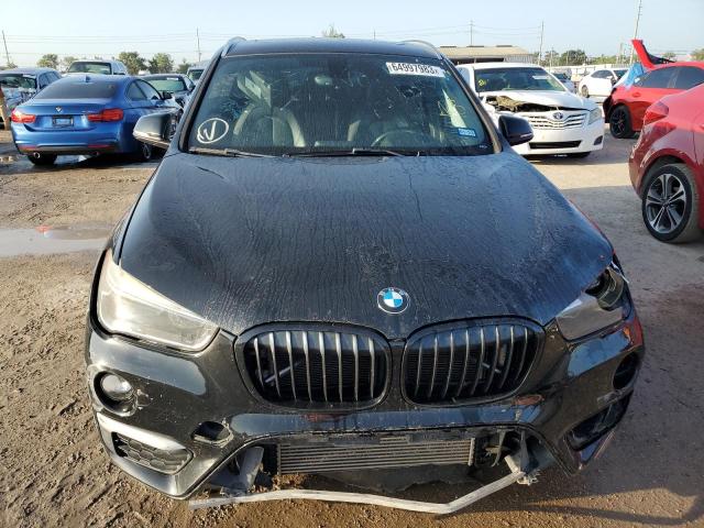 Photo 5 from auction – 2016 BMW X1 XDRIVE2 with VIN WBXHT3C3XG5E54261