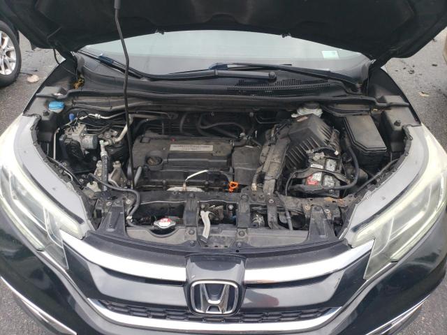 Photo 11 from auction – 2015 HONDA CR-V EX with VIN 3CZRM3H50FG709734