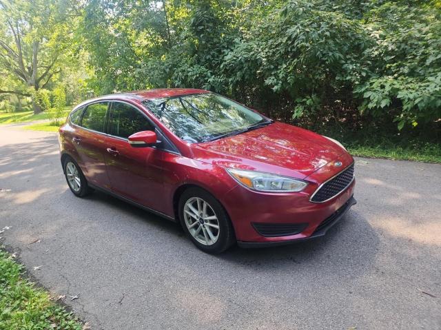 FORD FOCUS SE 2015 with VIN 1FADP3K23FL228410 - Photo from auction