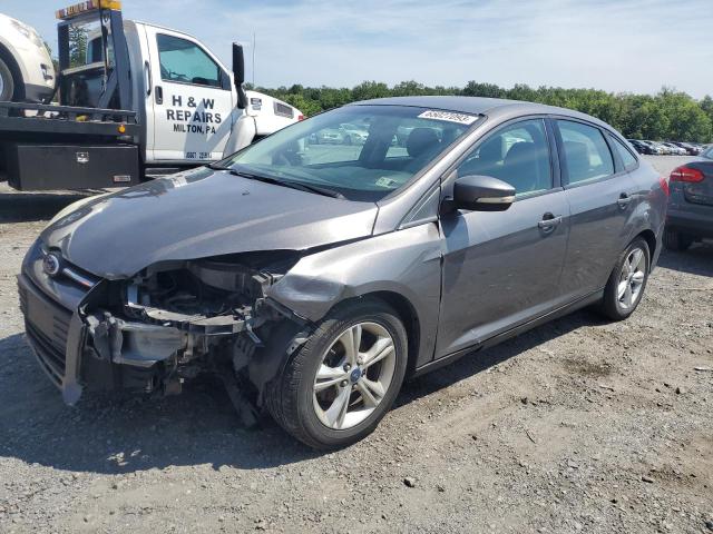 FORD FOCUS SE 2014 with VIN 1FADP3F26EL376012 - Photo from auction