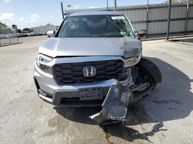 Photo 5 from auction – 2022 HONDA PASSPORT E with VIN 5FNYF8H50NB018717