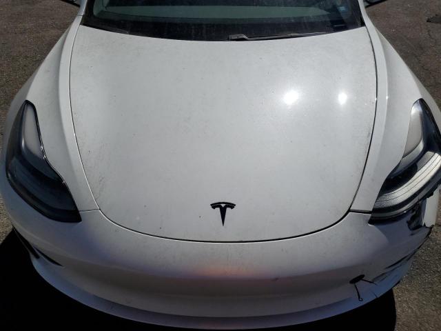 Photo 11 from auction – 2021 TESLA MODEL 3 with VIN 5YJ3E1EA5MF936399