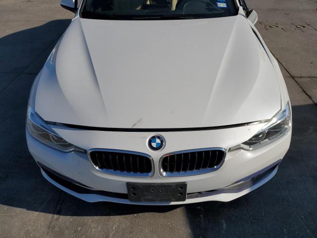 Photo 11 from auction – 2018 BMW 330 I with VIN WBA8B9G53JNU57471