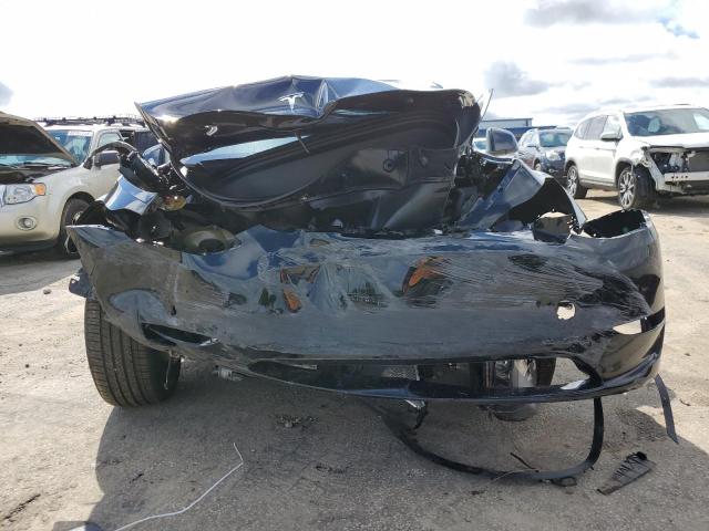 Photo 5 from auction – 2023 TESLA MODEL Y with VIN 7SAYGDEF8PF813152