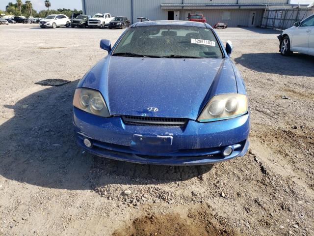 Photo 5 from auction – 2004 HYUNDAI TIBURON with VIN KMHHM65D34U107219