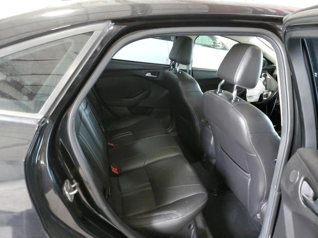 Photo 10 from auction – 2012 FORD FOCUS TITA with VIN 1FAHP3J25CL297341